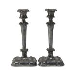 A PAIR OF SILVERPLATED CANDLESTICKS, UNITED STATES BROADWAY 1886/1928 with torch shaft and