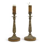 A PAIR OF CANDLESTICKS IN ORMOLU, EARLY 20TH CENTURY of eighteenth-century taste, chiseled to