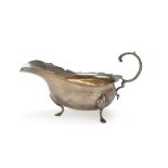 GRAVY BOAT IN SILVER, PUNCH BIRMINGHAM 1904 smooth body and moved edge, handle and footsies shaped