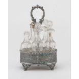 CRUET IN SILVER-PLATED METAL, SHEFFIELD 1835 ca. oval shape with five bottles in cut crystal. Body