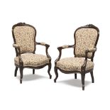 A BEAUTIFUL PAIR OF ARMCHAIRS IN MAHAGONY, 19TH CENTURY shield back with slight floral carving.