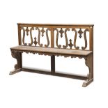 BENCH IN WALNUT, ITALY CENTRAL LATE 18TH CENTURY back pierced to spiral scrolls and campanulas.