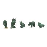 FIVE SMALL SCULPTURES IN MALACHITE, 20TH CENTURY representing a face and animals. Maximum size cm. 6