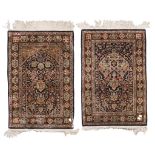 A PAIR OF INDIAN AGRA BED RUGS, MID-20TH CENTURY in wool and silk, prayer design with motifs of