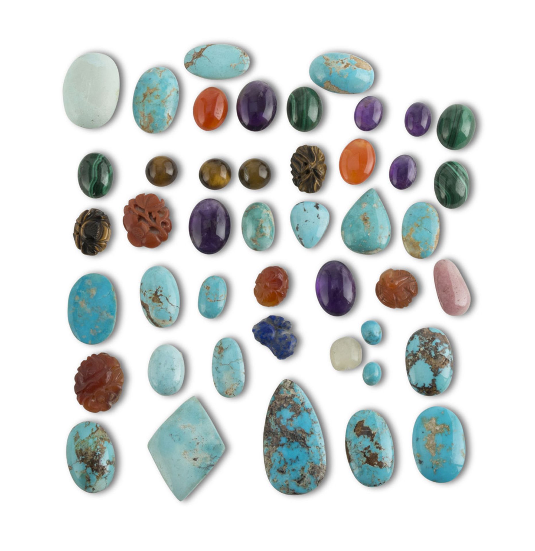 SAMPLING OF HARD STONES, 20TH CENTURY Consisting of spools of turquoise, malachite tiger's eye,