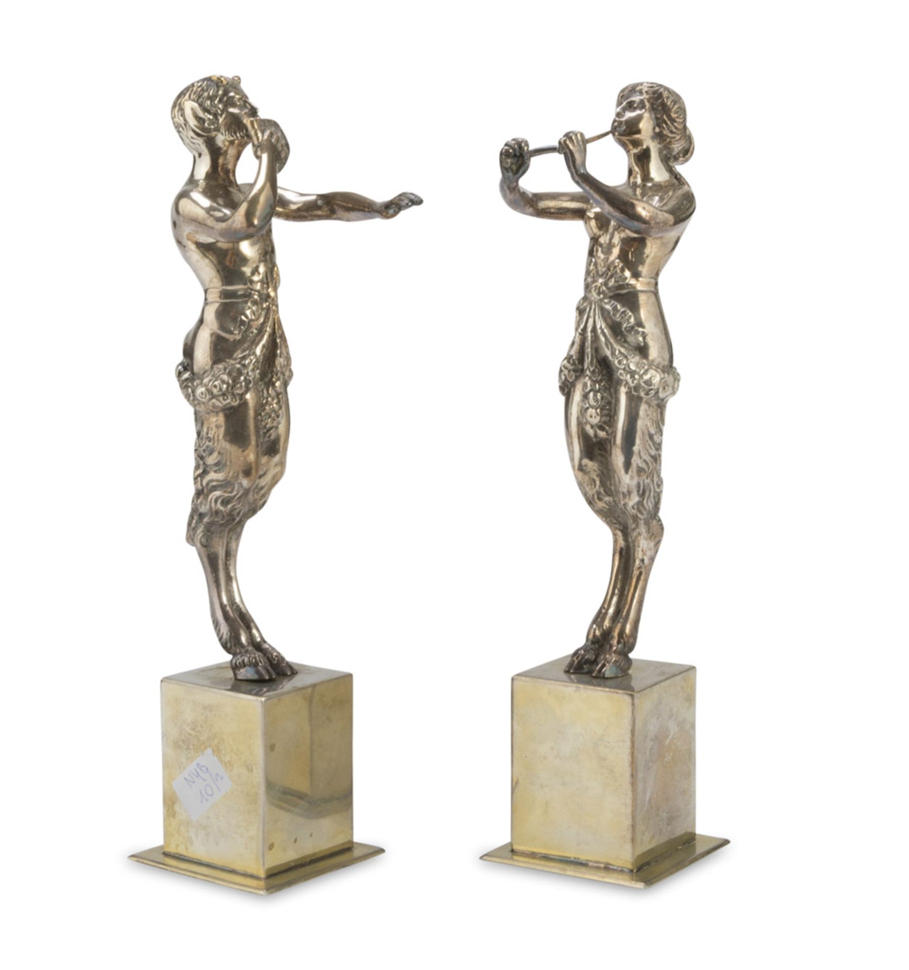 A PAIR OF SILVERED BRONZE SCULPTURES, EARLY 20TH CENTURY representing musician fauns. Cubic bases.