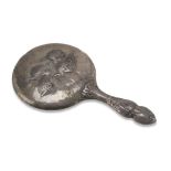 HAND MIRROR IN SILVER, PUNCH BIRMINGHAM 1906 embossed with heads of cherubs and floral motifs.