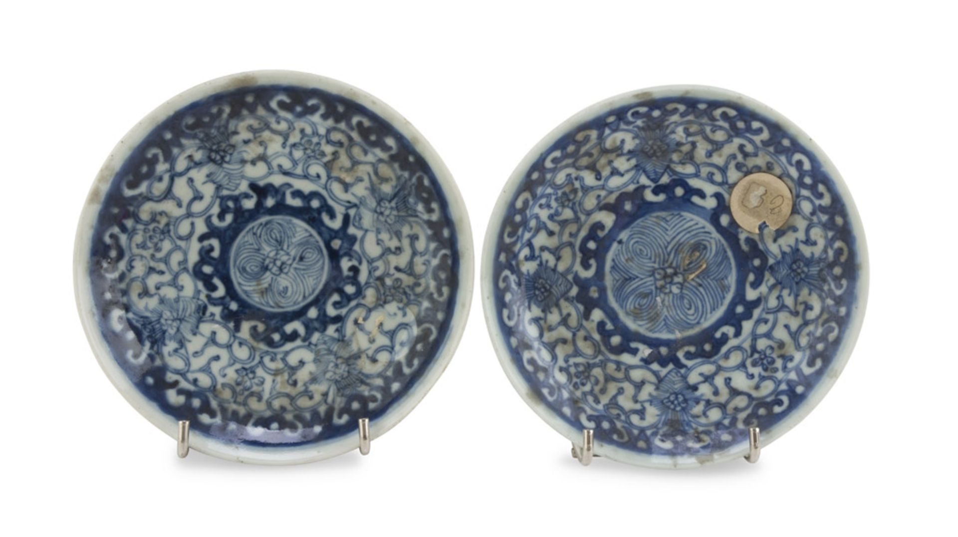 TWO WHITE AND BLUE PORCELAIN DISHES, CHINA 19TH CENTURY decorated with floral interlacements and