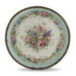 TRAY IN PORCELAIN, LATE 19TH CENTURY decorated with flowers in polychromy. Border in brass with