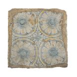 TILE IN MAIOLICA, END 18TH CENTURY in polychromy, decorated with daisies. Measures cm. 19 x 19.