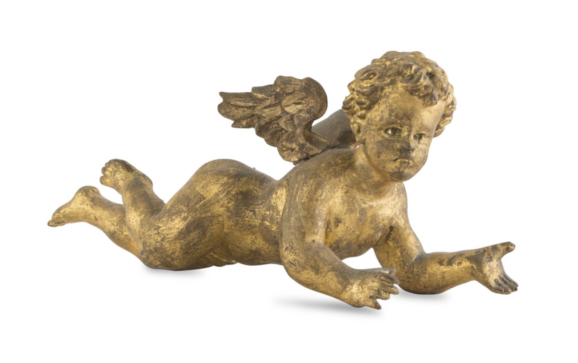 FIGURE OF CHERUB IN GILTWOOD, EARLY 20TH CENTURY in reclining pose. Measures cm. 16 x 10 x 30.