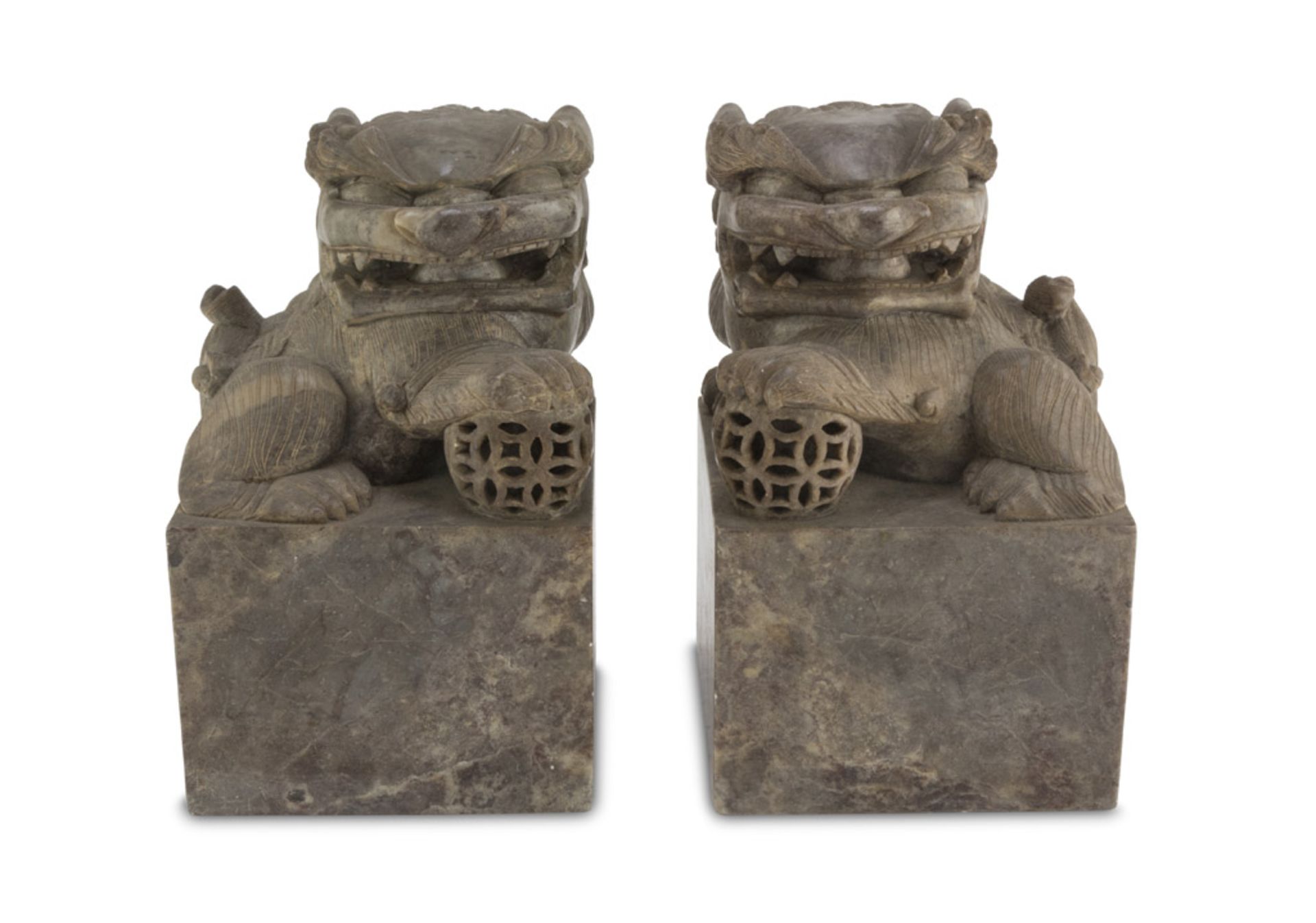 A PAIR OF MARBLE SCULPTURES, CHINA 20TH CENTURY representing two Shishi in protective pose. Measures