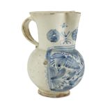 MAIOLICA PITCHER, CENTRAL ITALY, 18TH CENTURY in white and blue enamel decorated on the front with