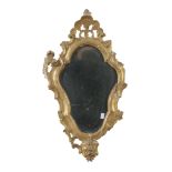 A PAIR OF SMALL MIRRORS IN GILTWOOD, PROBABLY VENETIAN, 18TH CENTURY frames sculpted to small