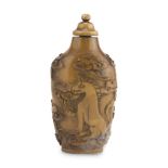 SNUFF BOTTLE IN TIGER'S EYE, CHINA 20TH CENTURY sculpted and engraved with motifs of landscape