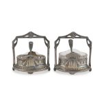 A PAIR OF SALTCELLARS IN SILVER-PLATED METAL, EARLY 20TH CENTURY of oval body, decorated with