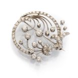 BEAUTIFUL BROOCH in white gold 18 kts., stylized peacock design with round diamonds of various