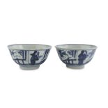 TWO WHITE AND BLUE PORCELAIN CUPS, CHINA EARLY 20TH CENTURY decorated with representations of
