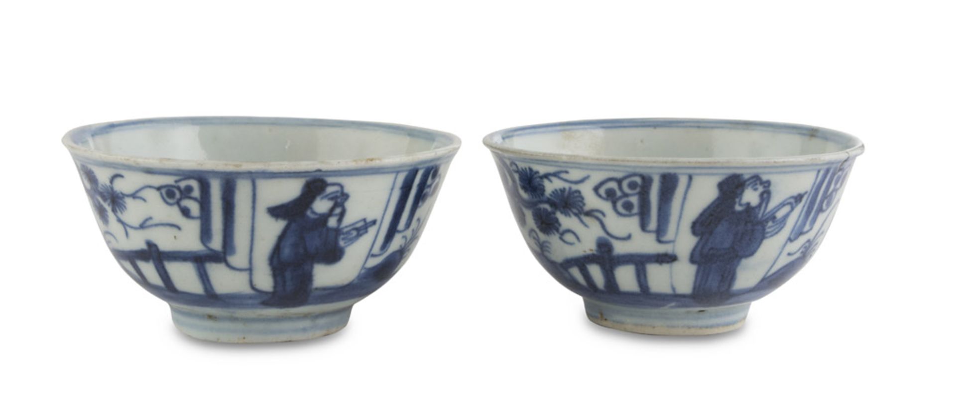 TWO WHITE AND BLUE PORCELAIN CUPS, CHINA EARLY 20TH CENTURY decorated with representations of