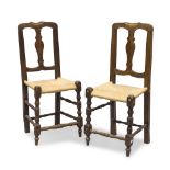 A PAIR OF WALNUT CHAIRS, CENTRAL ITALY 18TH CENTURY pierced back with lyre splat. Seats in straw,
