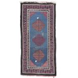 CHINESE-TIBETAN CARPET, LATE 19TH CENTURY triple meander medallion on light blue ground. Measures