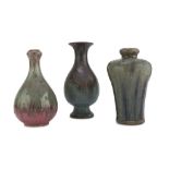 THREE CERAMIC VASES, CHINA 20TH CENTURY decorated with flambé glaze. Maximum size cm. 26 x 13.