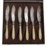 SIX SILVER FISH KNIVES, PUNCH BIRMINGHAN 1864 with bone handles and blades chiseled to figures of