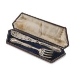 TWO PIECES OF SILVER ROAST CUTLERY, PUNCH LONDON 1890 blades pierced and engraved with leaves.