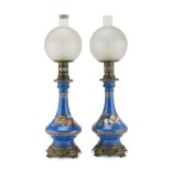 A PAIR OF OPALINE LAMPS, LATE 19TH CENTURY celestial ground with decorums of classical taste.