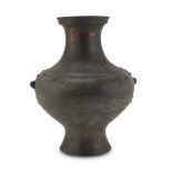 BIG VASE IN BURNISHED EARTHENWARE, CHINA 20TH CENTURY with long neck and taotie handles. Measures