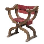 RARE SAVONAROLA CHAIR IN WALNUT, CENTRAL ITALY 17TH CENTURY with arms filleted in boxwood. Seat