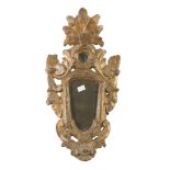 FOUR SMALL SMALL MIRRORS IN GILTWOOD, PROBABLY UMBRIA 18TH CENTURY frames sculpted to leaves,