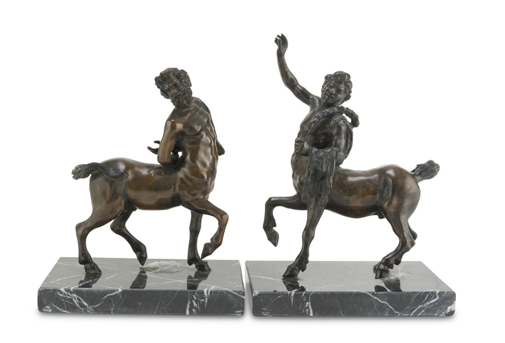 A PAIR OF BURNISHED BRONZE SCULPTURES, LATE 19TH CENTURY representing centaurs. Bases in portoro