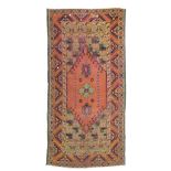 BEAUTIFUL KIZ GHIORDES CARPET, ANATOLIA EARLY 20TH CENTURY medallion in blue and secondary motifs of