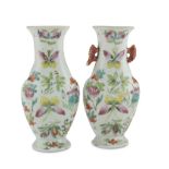 PAIR OF WALL FLOWER STANDS IN PORCELAIN, CHINA EARLY 20TH CENTURY decorated with butterflies, floral