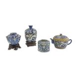 FOUR POLYCHROME ENAMELLED PORCELAIN OBJECTS, CHINA 20TH CENTURY Consisting of a teapot, two bowls