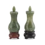 A Pair of Small Vases In Jade, China 20TH CENTURY with stem bodies and bulb covers. Measures cm. 6 x