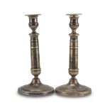 A PAIR OF CANDLESTICKS IN SILVER-PLATED METAL, 19TH CENTURY shaft with rings. h. cm. 25. COPPIA DI