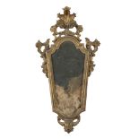 A PAIR OF SMALL MIRRORS IN GILTWOOD, VENETIAN 18TH CENTURY with friezes carved into small scrolls,