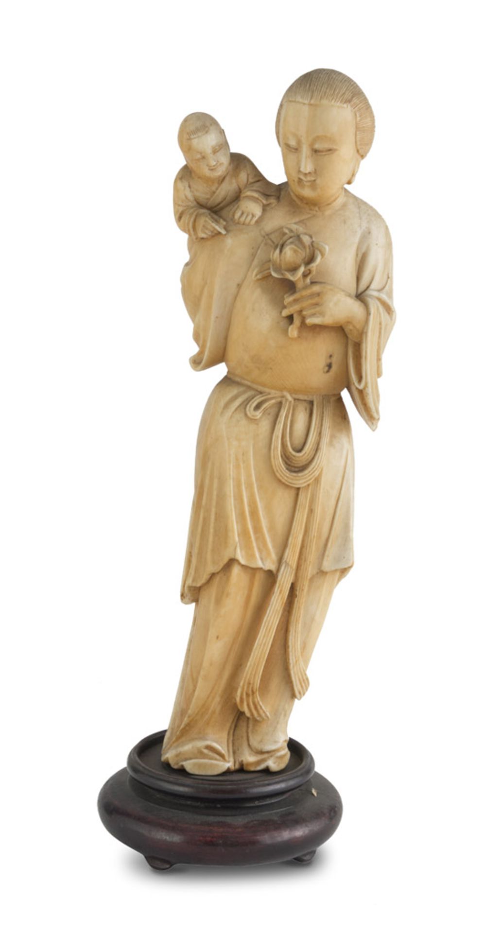 IVORY SCULPTURE, CHINA 19TH CENTURY representing He Xiangu with orderly child. Measures cm. 25 x 8 x