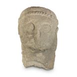 RARE STONE SCULPTURE, MEDIEVAL PERIOD representing face of monk, with cubic upright. Measures cm. 33