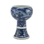WHITE AND BLU PORCELAIN CUP CHINA, 19TH CENTURY decorated with representations of big dragons,