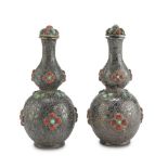 A PAIR OF METAL SNUFF BOTTLE, CHINA 20TH CENTURY decorated with engravings of floral