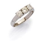 TRILOGY RING in white gold 18 kts., with three diamonds. Diamonds ct. 0.80, color LM, clarity S3,