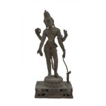BRONZE SCULPTURE WITH BURNISHED PATINA, INDIA EARLY 20TH CENTURY representing Shiva supported by a