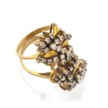 SPLENDID RING in yellow gold 18 kts., star shaped with diamond lines. Diamonds ct. 0.60, total