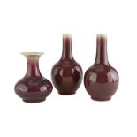 THREE PORCELAIN VASES, CHINA 20TH CENTURY decorated with a red ritual glaze. Measures cm. 19 x 10,