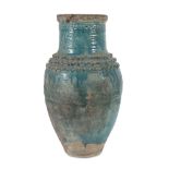 BIG GREEN GLAZED CERAMIC VASE, TURKEY 19TH CENTURY decorated with stylized floral engravings and