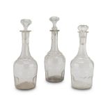 THREE BOTTLES IN BLOWN GLASS, 19TH CENTURY Maximum size cm. 35 x 13. TRE BOTTIGLIE IN VETRO