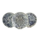 THREE BLUE AND WHITE PORCELAIN DISHES, CHINA EARLY 20TH CENTURY decorated with peonies, rocks and